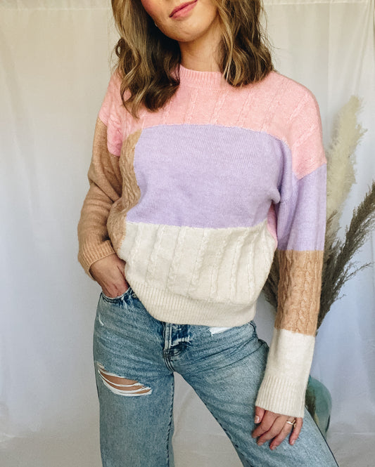 Pink, purple, Tan and cream color block cable knit long sleeve sweater